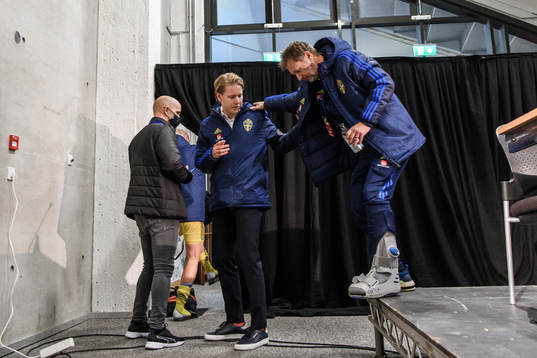 Media officer Fredrik Madestam and head coach Peter