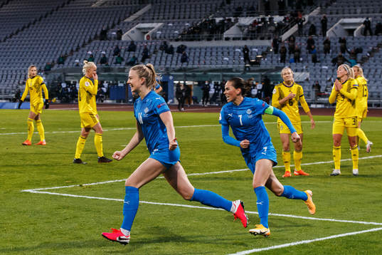 Elin Metta Jensen and Sara Björk Gunnarsdottir of Iceland