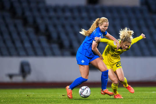 Glodis Perla Viggosdottir of Iceland and Mimmi Larsson of