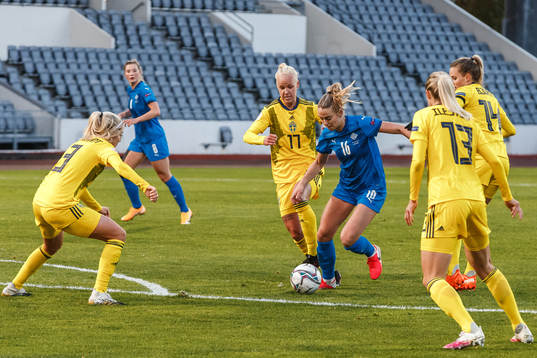 Caroline Seger of Sweden against Elin Metta Jensen of