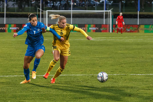 Sara Björk Gunnarsdottir of Iceland and Magdalena Eriksson