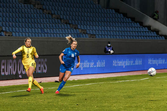 Magdalena Eriksson of Sweden and Elin Metta Jensen of