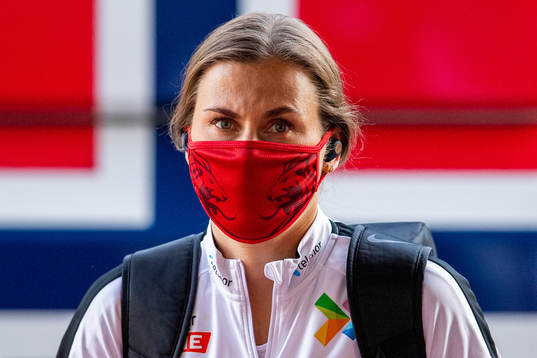 Emilie Bosshard Haavi of Norway arrives wearing a face mask