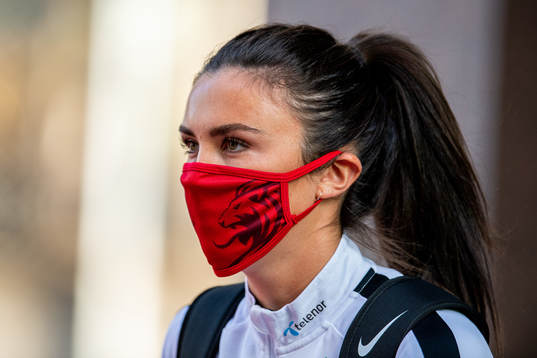Ingrid Syrstad Engen of Norway arrives wearing a face mask