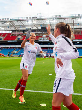 Lisa-Marie Karlseng Utland and Maren Mjelde of Norway warm