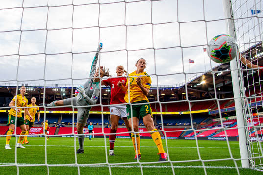 Goalkeeper Laura O'Sullivan of Wales lets in the 1-0 goal