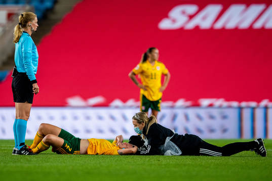 Anna Fibley of Wales with an injury