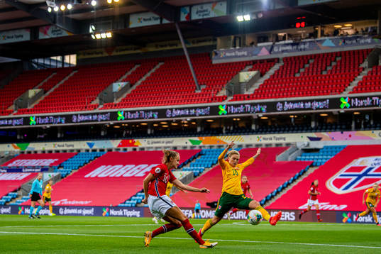 Caroline Graham Hansen of Norway and Jess Fishlock of Wales