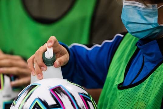 Staff sprays disinfection