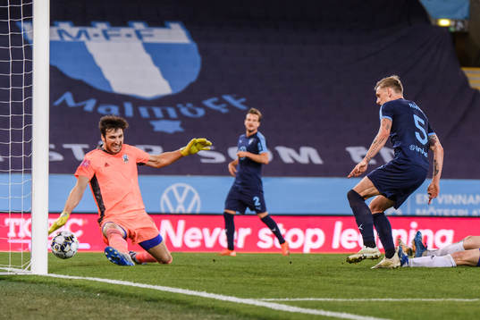 Sören Rieks of Malmö FF scores the 5-0 goal behind