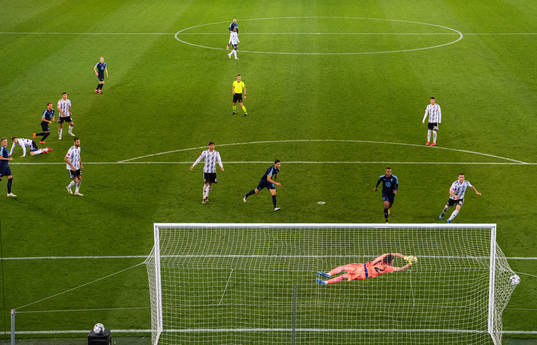 Eric Larsson of Malmö FF scores the 4-0 goal against