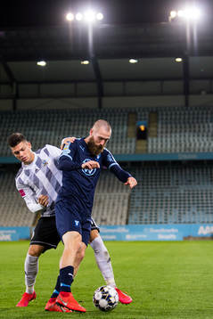 Oliver Petrak of Lokomotiva Zagreb and Jo Inge Berget of
