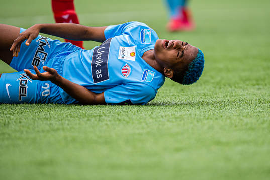Rasheedat Busayo Ajibade of Avaldsnes in pain