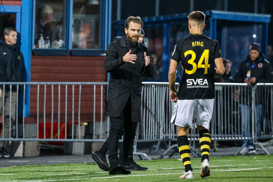 s Erik Ring och tränare Bartosz Grzelak