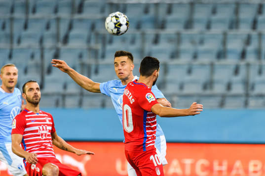 Jonas Knudsen of Malmö FF and Antonio Puertas of Granada