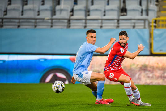 Jonas Knudsen of Malmö FF and Roberto Soldado of Granada