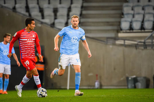 Angel Montoro of Granada and Ola Toivonen of Malmö FF