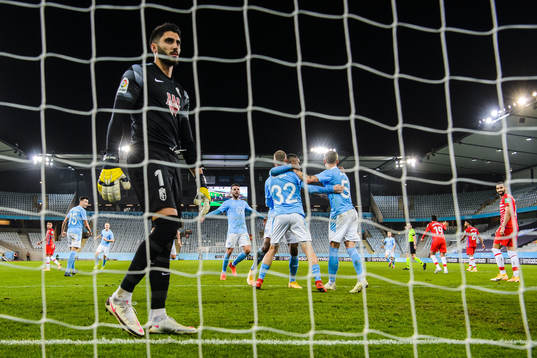Goalkeeper Rui Silva of Granada look dejected while Jo Inge