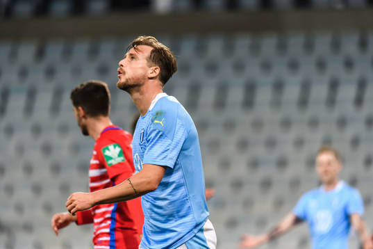 Eric Larsson of Malmö FF looks dejected