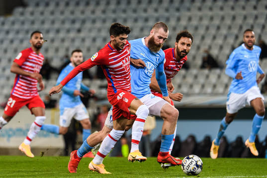 Carlos Neva of Granada and Jo Inge Berget of Malmö FF