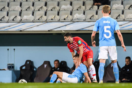 Antonio Puertas of Granada and Jonas Knudsen of Malmö FF