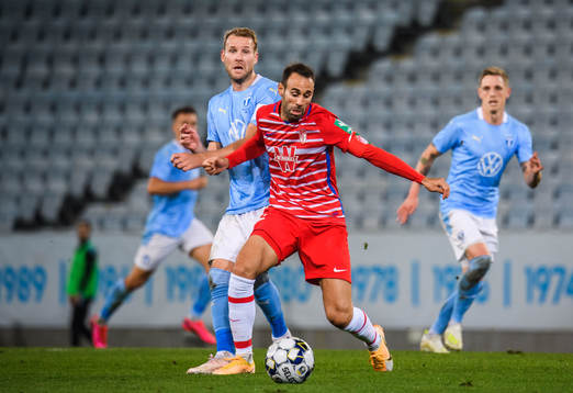 Victor Diaz of Granada and Ola Toivonen of Malmö FF