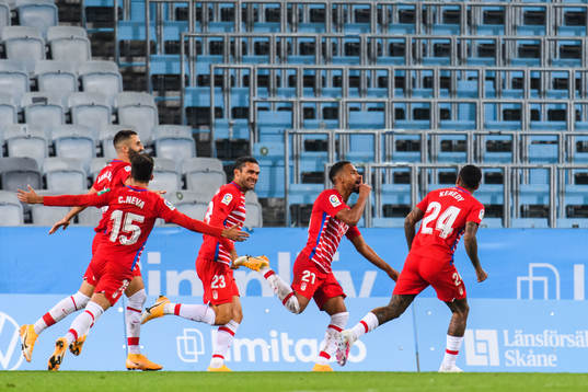 Yangel Herrera of Granada celebrate with teammates