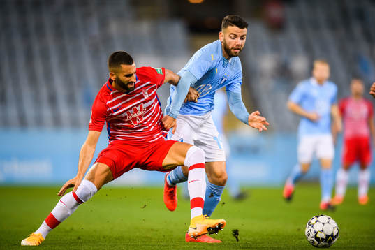 Gonalons of Granada and Erdal Rakip of Malmö FF