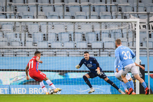 Darwin Machis of Granada scores 0-1 behind goalkeeper Marko