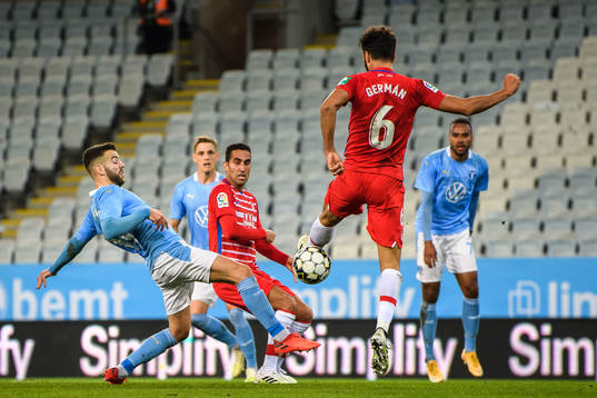Erdal Rakip of Malmö FF and German Sanchez of Granada