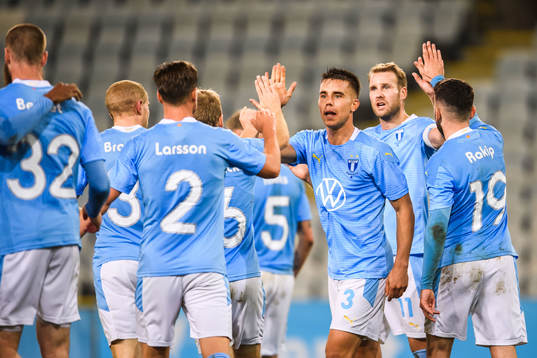 Jonas Knudsen and Ola Toivonen celebrate with teammates