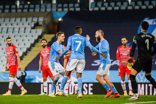 Sören Rieks and Isaac Kiese Thelin celebrate with Jo Inge