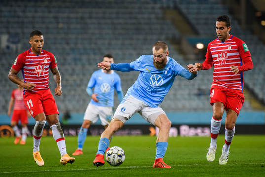 Jo Inge Berget of Malmö FF and Angel Montoro of Granada