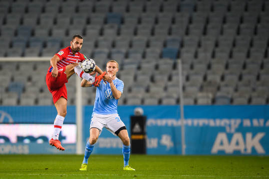 Roberto Soldado of Granada and Franz Brorsson of Malmö FF
