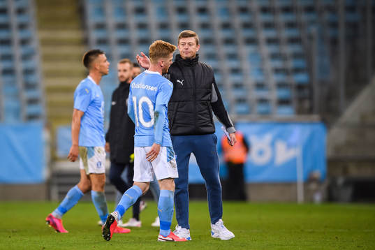 Anders Christiansen and Jon Dahl Tomasson, head coach of