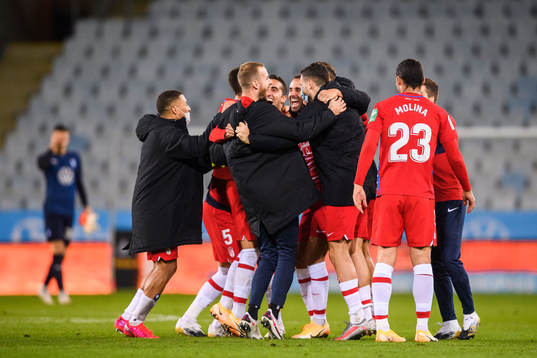 Players of Granada celebrate