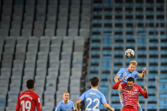 Oscar Lewicki of Malmö FF and Jorge Molina of Granada