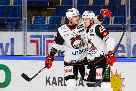 Malmö Redhawks Fredrik Händemark och Helge Grans jublar