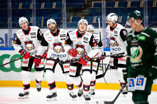 Malmö Redhawks Helge Grans jublar med lagkamrater