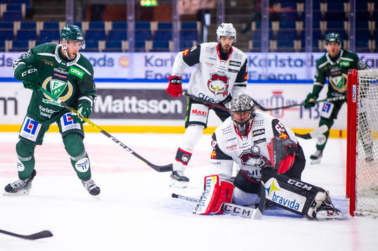 Färjestads Per Åslund och Malmö Redhawks målvakt Oscar