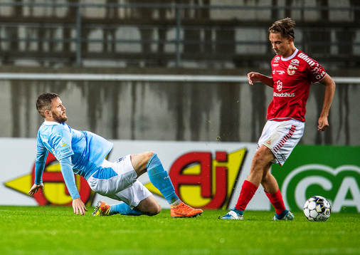 Kalmars Isak Magnusson och Malmö FFs Lasse Nielsen