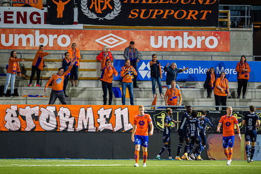 Spectators in the stands reactscts