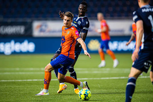 Sigurd Hauso Haugen of Aalesund and Amidou Diop of