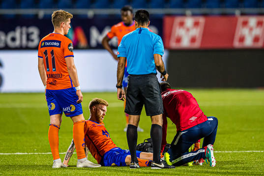 Fredrik Kjernmoen Carlsen of Aalesund with an injury