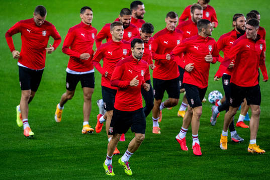 Luka Milivojević and players of the Serbian national