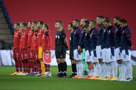 Players of Norway and of Serbia