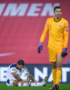 Aleksandar Mitrovic of Serbia looks dejected behind