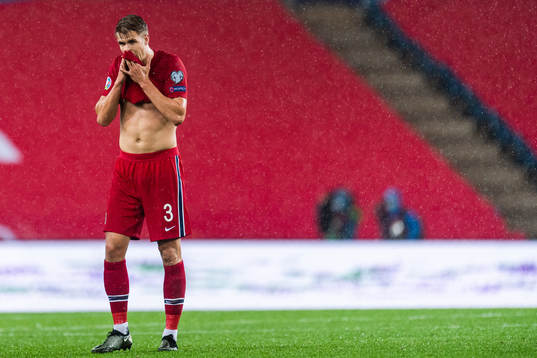 Kristoffer Ajer of Norway looks dejected