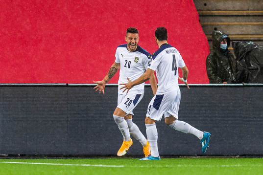 Sergej Milinkovic-Savic and Luka Milivojevic of Serbia