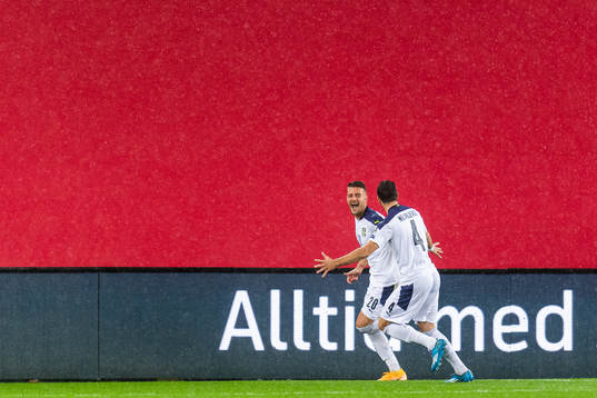 Sergej Milinkovic-Savic and Luka Milivojevic of Serbia